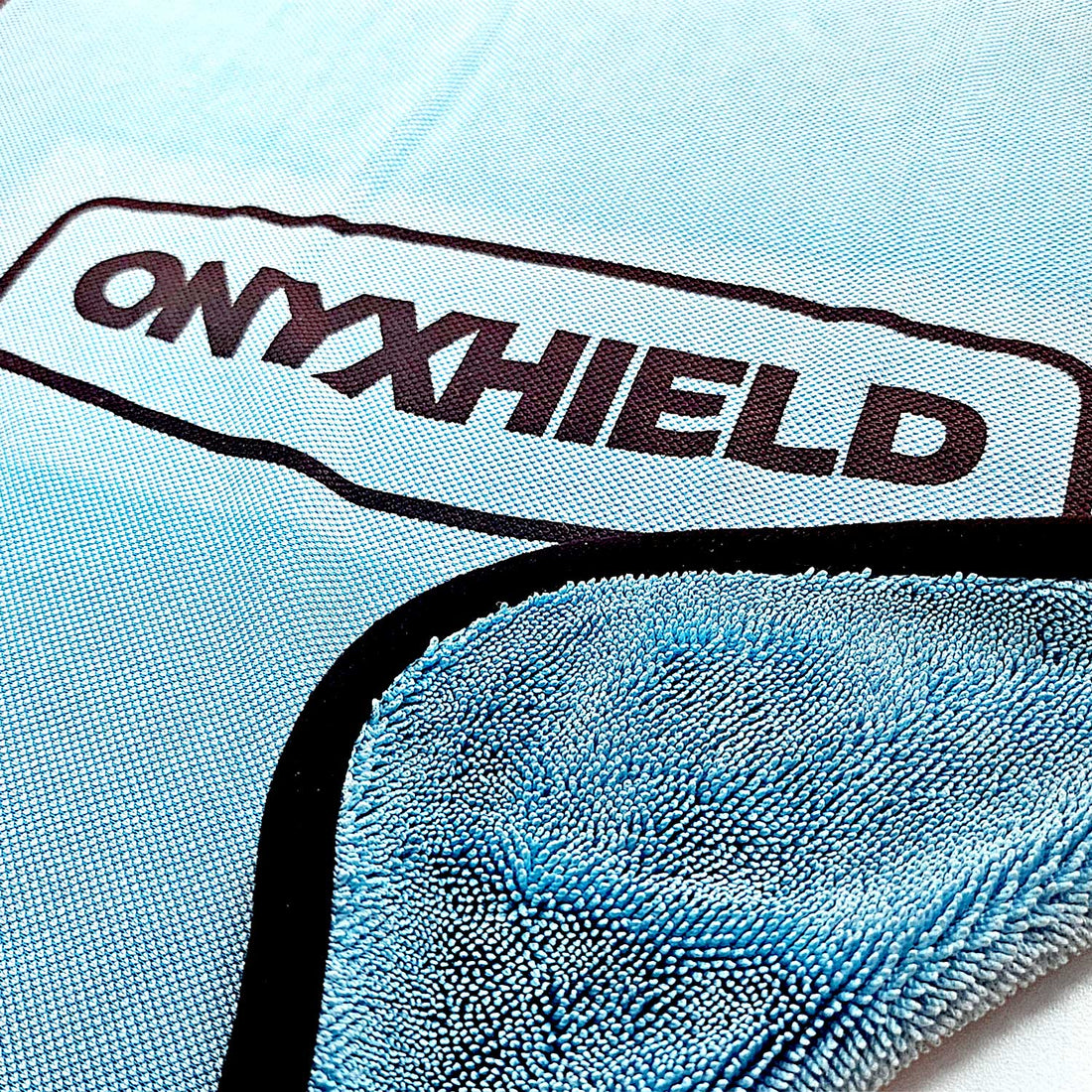 Onyxhield Towel - Blue Black Border