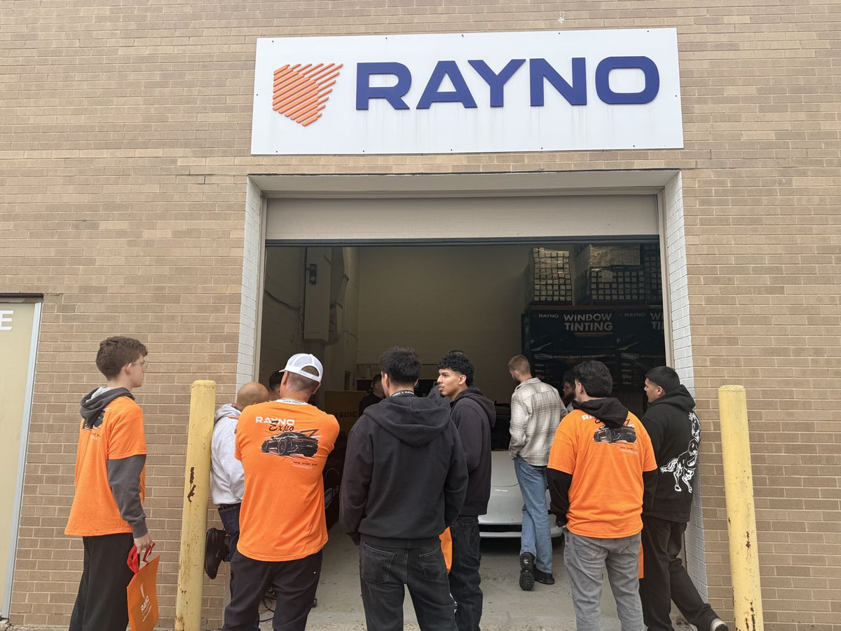Attendees at the Rayno warehouse door