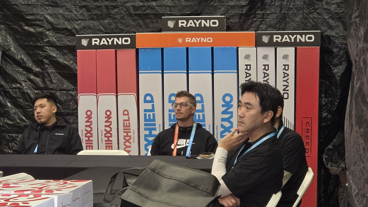 Rayno team presenting to attendees